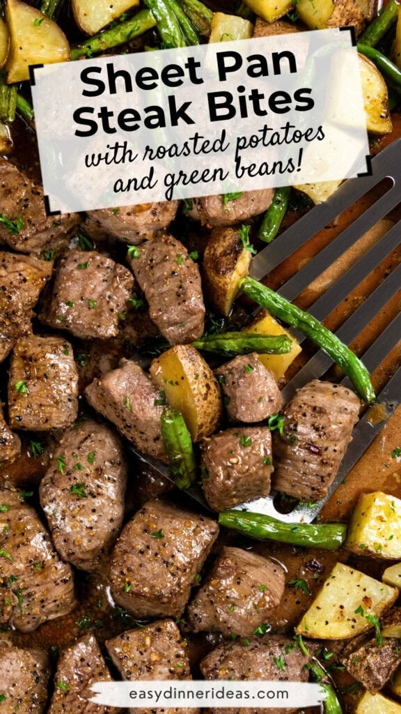 Sheet pan with bite-sized steak pieces, roasted potatoes, and green beans. A spatula lifts some steak, and text on the image describes the dish. Food is garnished with herbs.