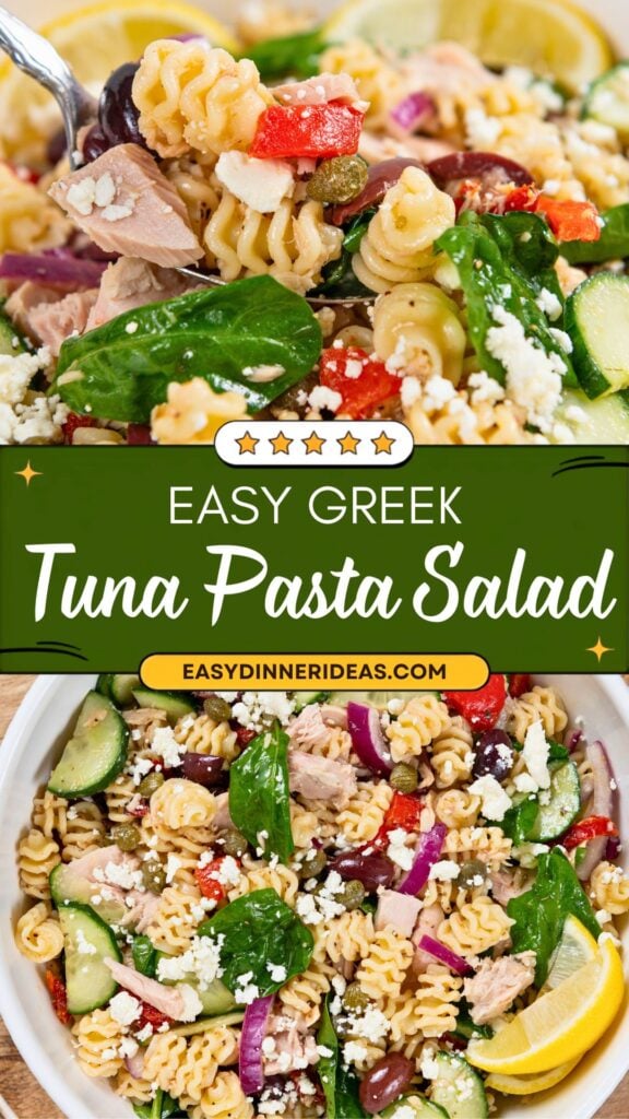 A close-up of Greek tuna pasta salad with rotini, spinach, olives, cucumber, red onion, and feta cheese, garnished with lemon wedges.