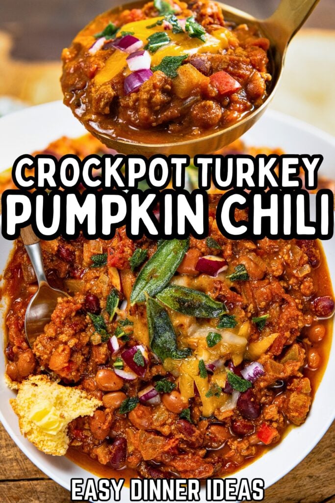 A bowl of crockpot turkey pumpkin chili topped with cheese, herbs, and onions. A spoon lifts a serving above the bowl.