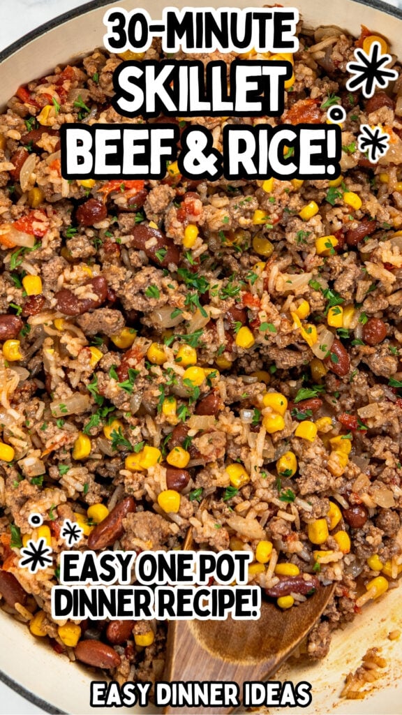 A skillet filled with a mixture of ground beef and rice with corn and pinto beans all topped with fresh herbs.